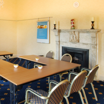 The Cambridge meeting room at Mercure York Fairfield Manor Hotel, set up for a meeting