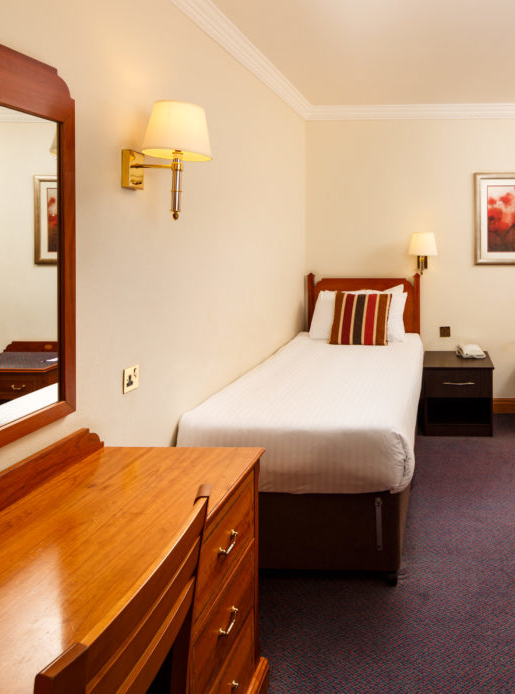 Classic single bedroom at Mercure York Fairfield Manor Hotel, single bed, flatscreen tv, desk