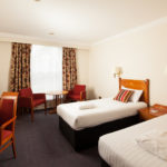 Classic twin bedroom at Mercure York Fairfield Manor Hotel, 2 single beds, flatscreen tv, desk