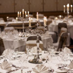 Close up of silver candlestick centrepiece in the Parkside Suite at Mercure York Fairfield Manor Hotel