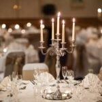 Close up of silver candlestick centrepiece in the Parkside Suite at Mercure York Fairfield Manor Hotel