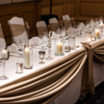 Close up of top table at wedding breakfast in the Parkside Suite at Mercure York Fairfield Manor Hotel