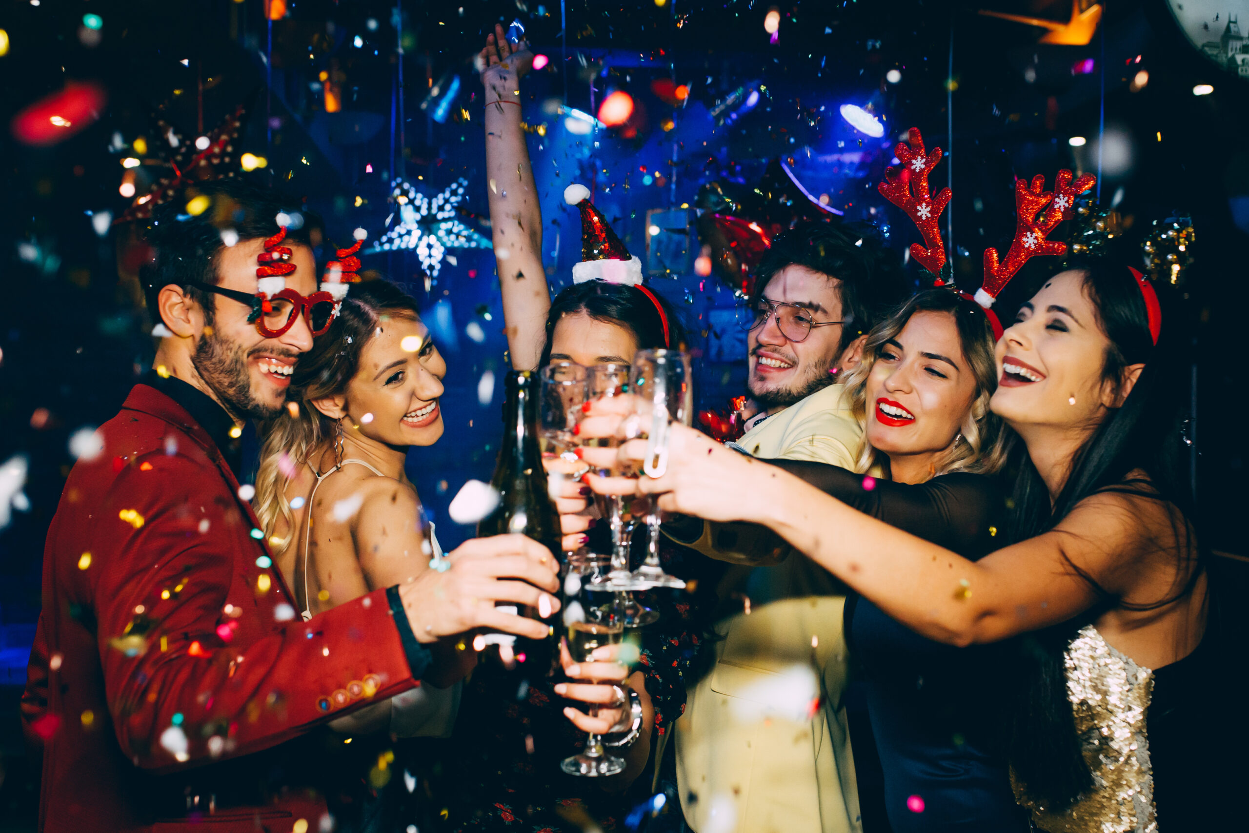 Group,Of,Friends,Having,Fun,And,Toasting,At,New,Year's Work colleges partying